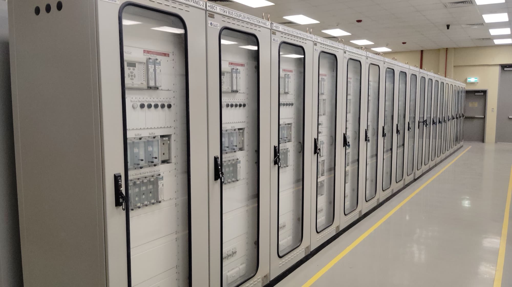 Row of electrical protection panels in a substation control room