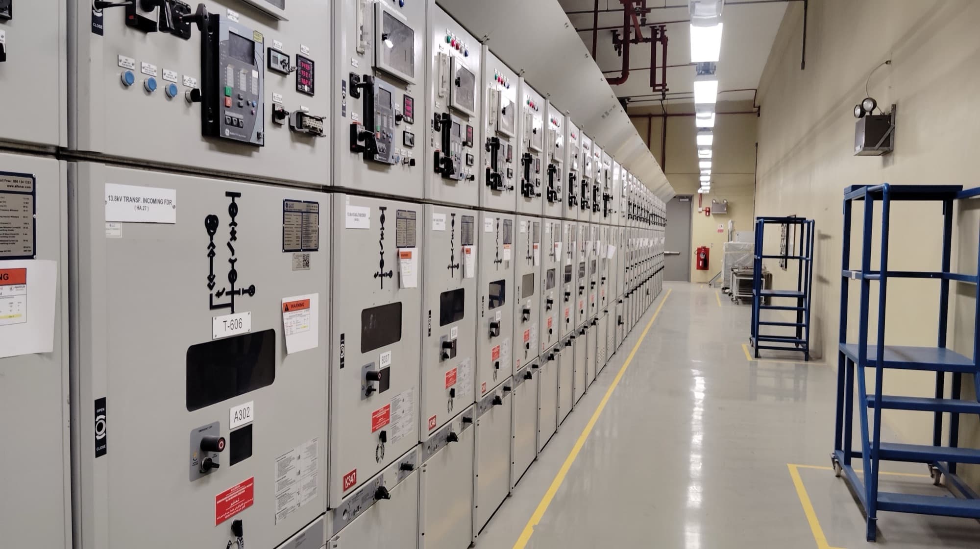 Rows of electrical switchgear panels in a distribution room